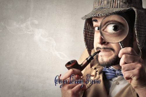 chercheur avec loupe